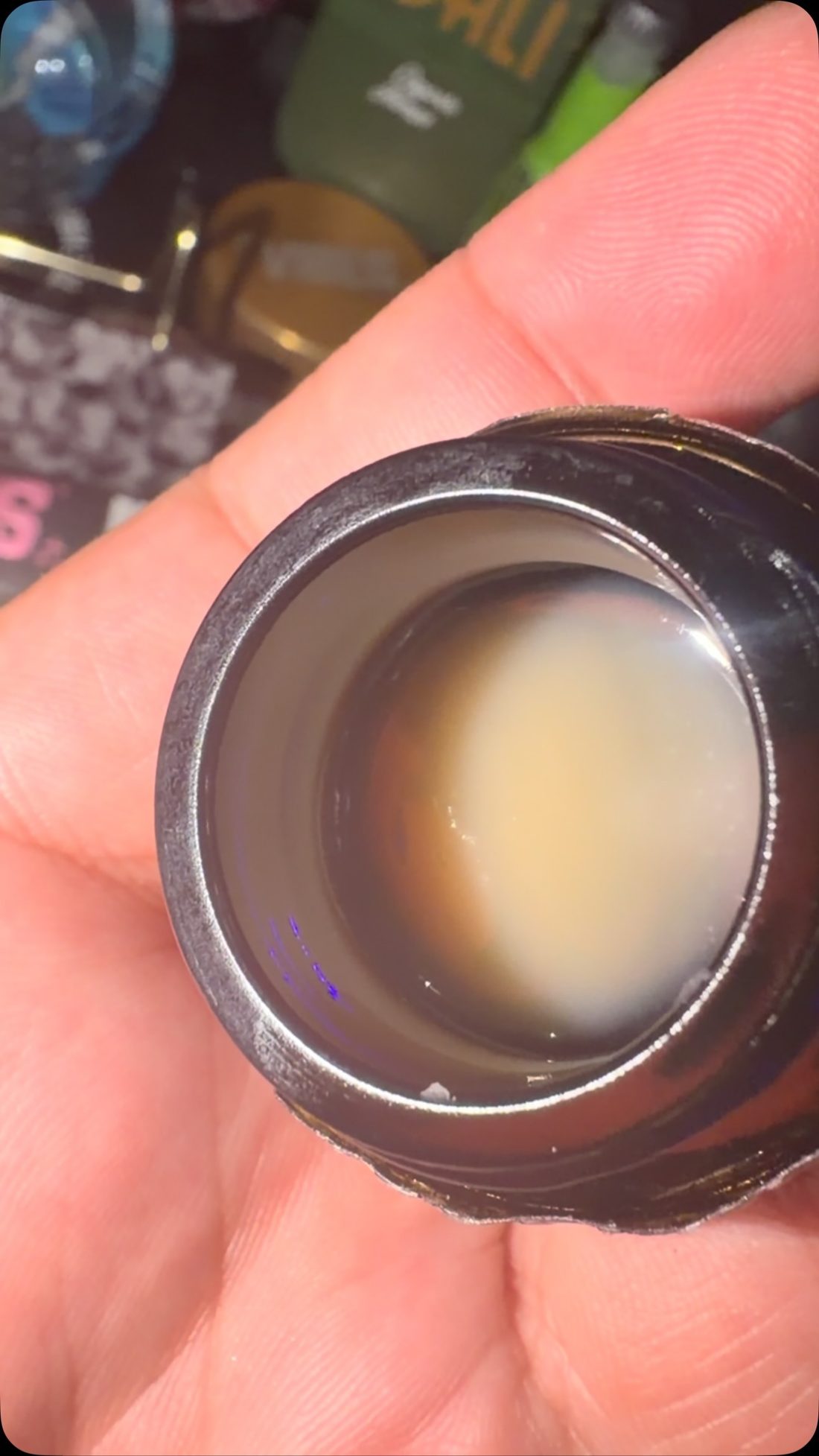 Fresh-pressed Old School Cure solventless live rosin in the jar